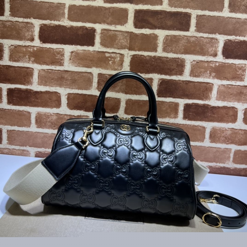G*u*i top handle bags